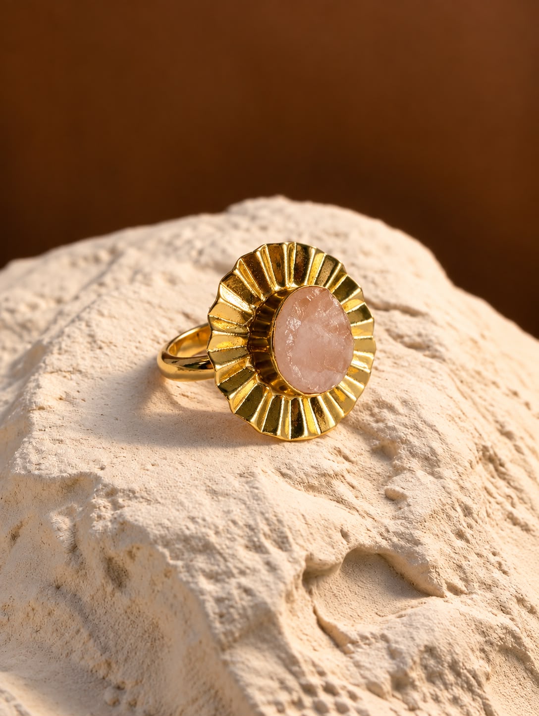 Blush stone pleated halo ring
