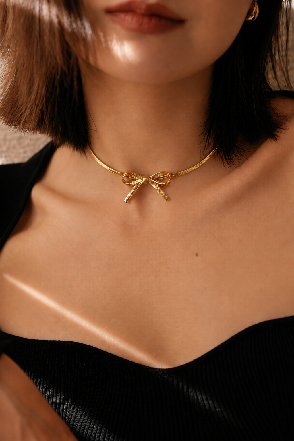 Polished bow collar necklace