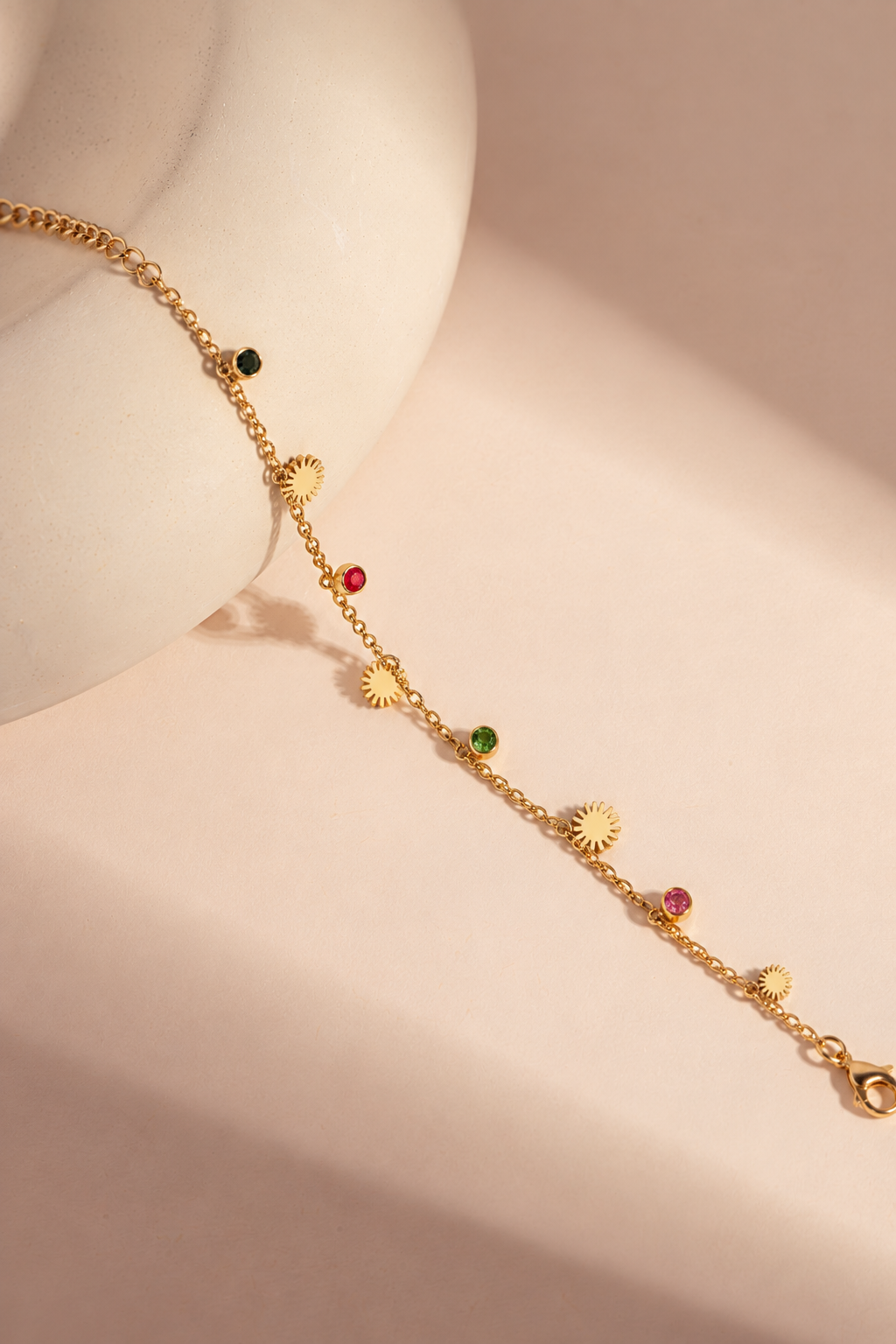 Sun charm and multicolour bead bracelet